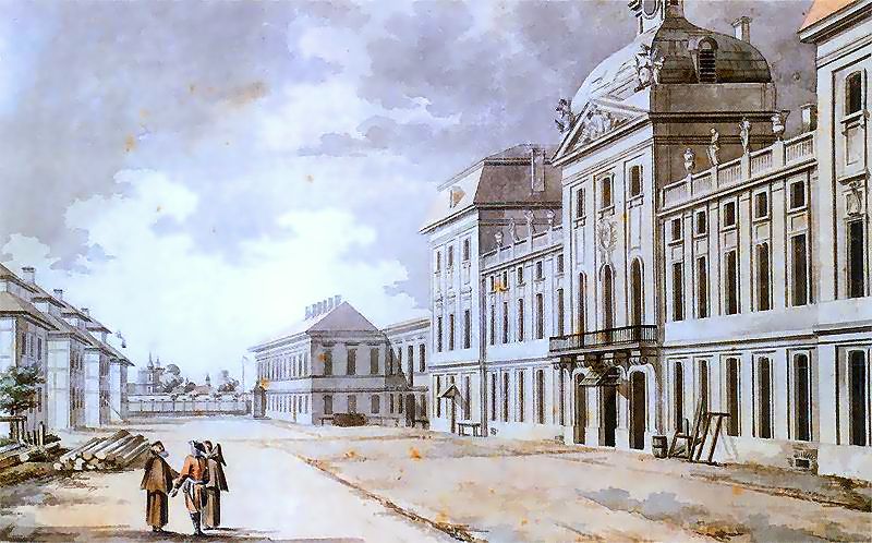 Zygmunt Vogel, Szkoła Rycerska, Warszawa, 1785; akwarela; źródło: Wikipedia Akwarela przedstawiająca gmach Pałacu Kazimierzowskiego w Warszawie, stanowiącego główny korpus Szkoły Rycerskiej, czyli Korpusu Kadetów. Budynek reprezentacyjny w klasycystycznej formie, ukazany od strony ulicy. W tle widoczne dalsze zabudowania, po prawej stronie sceny trzej wojskowi. Niebo w oddali zachmurzone, sprawia wrażenie burzowego. Całość malowana w jasnych przejrzystych kolorach.