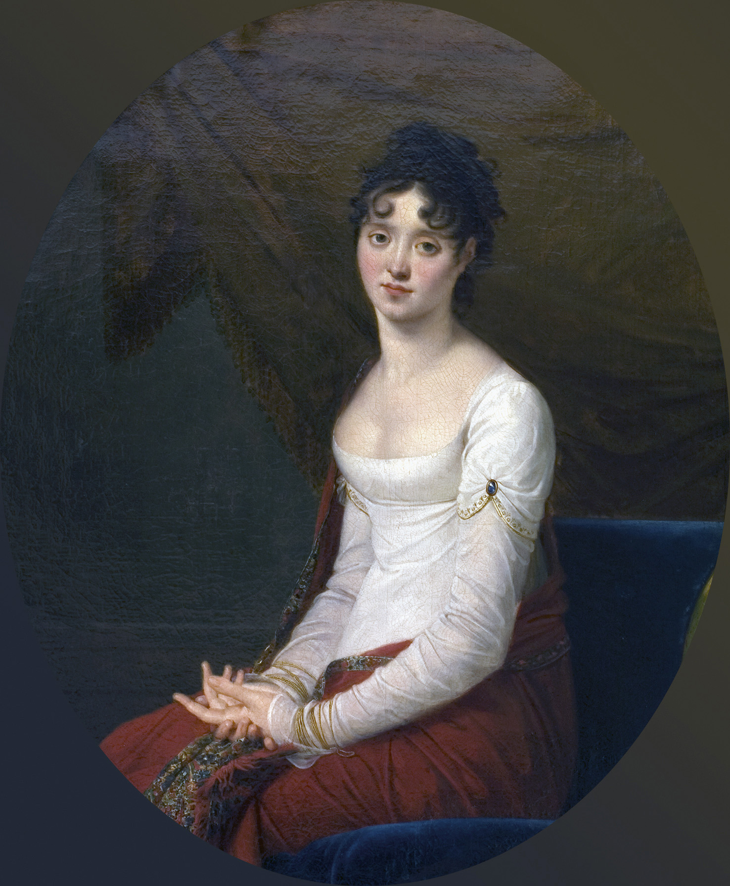 Portret. Zofia z Czartoryskich Zamoyska, autor Robert Lefevre, Francja/Paryż, 1804-1805, wymiary: 111 x 91 cm, technika: olej na płótnie.
Młoda kobieta siedząca w fotelu, ubrana w empirową suknię z dekoltem. Otulona czerwonym szalem obszytym frędzlami.